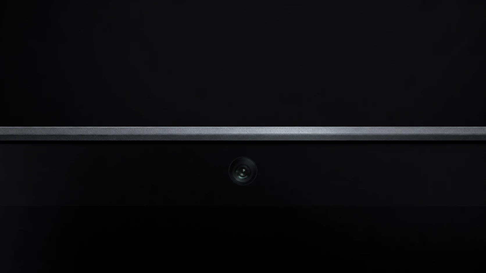 A close view of a Mac camera before local posture processing
